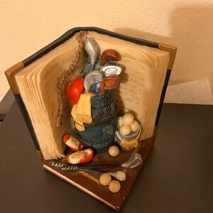 Whimsical Golf-Themed Sculpture with Red and Blue Details